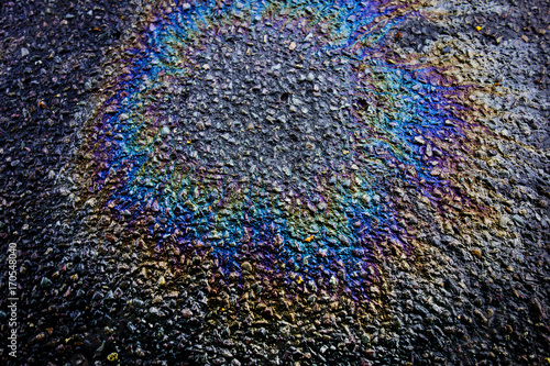 Metallic Rainbow Petrol Spill on Pavement Sidewalk