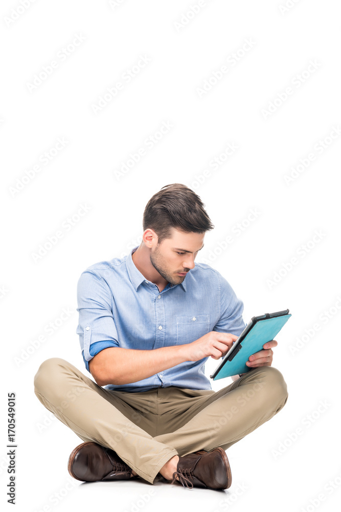 young man using tablet young man using tablet