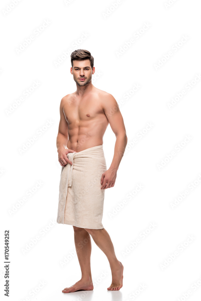 Fototapeta premium man covering with towel after shower