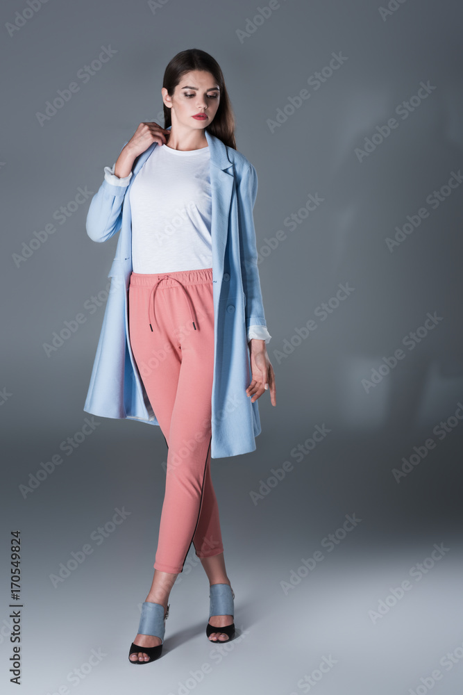girl in blue trench