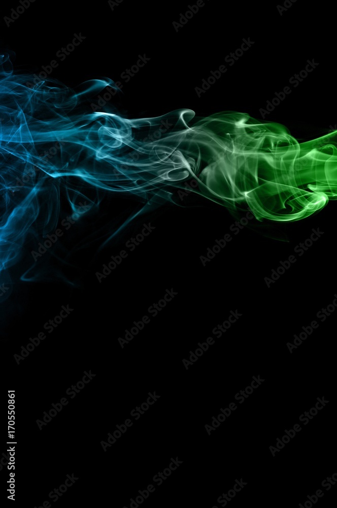 Abstract green and blue smoke on black background, smoke background,green and blue ink background,green and blue, beautiful color smoke Abstract green and blue smoke on black background, smoke background,green and blue ink background,green and blue, beautiful color smoke