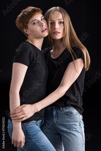 lesbian couple touching cheeks