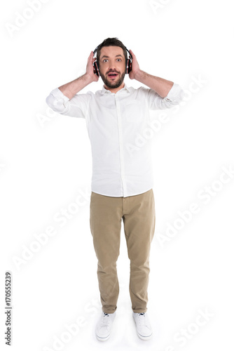 Surprised man in big headphones