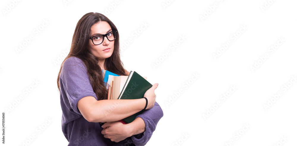 Attractive young student with lots of books Attractive young student with lots of books