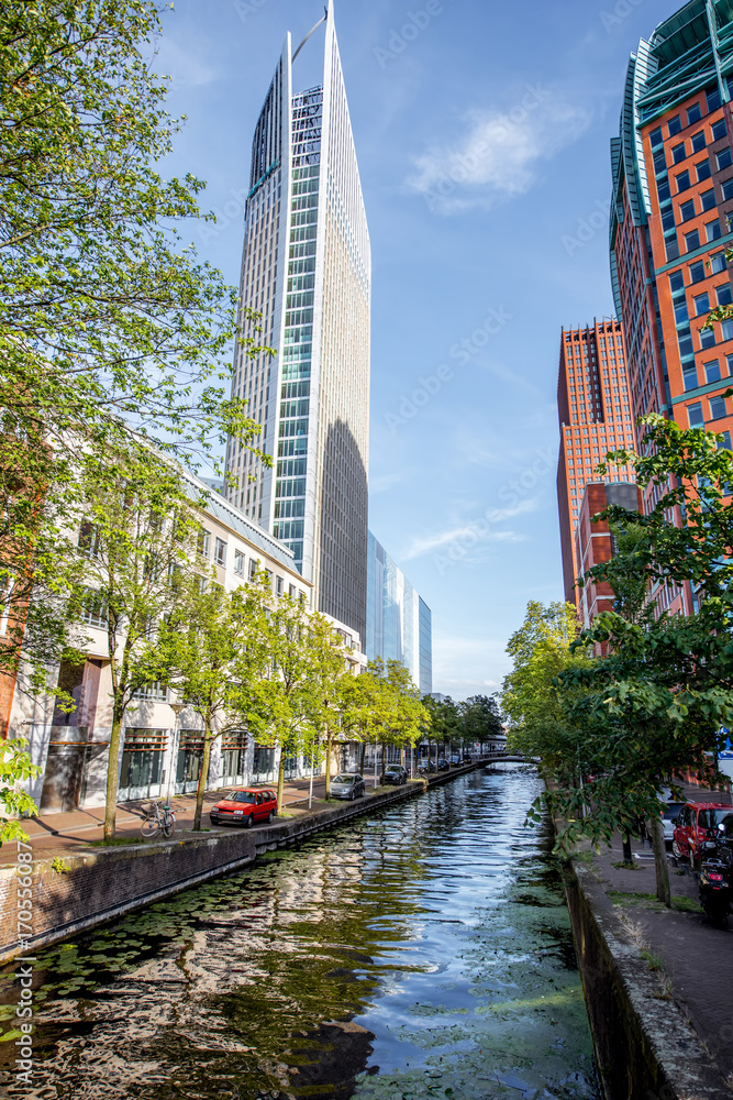 View on the water channel and beautiful skyscrapers in Haag city, Netherlands - obrazy, fototapety, plakaty 