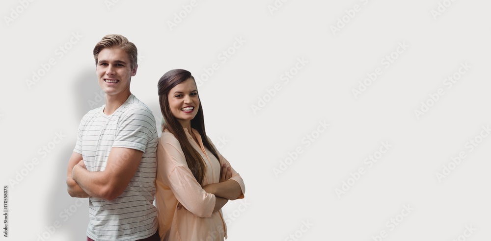 Composite image of young smiling people are posing with crossed Composite image of young smiling people are posing with crossed