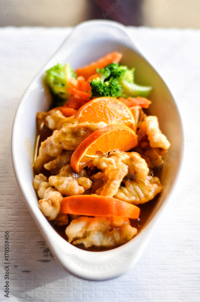 Orange Chicken, Light battered chicken with broccoli, carrot and orange sauce. Orange Chicken, Light battered chicken with broccoli, carrot and orange sauce.