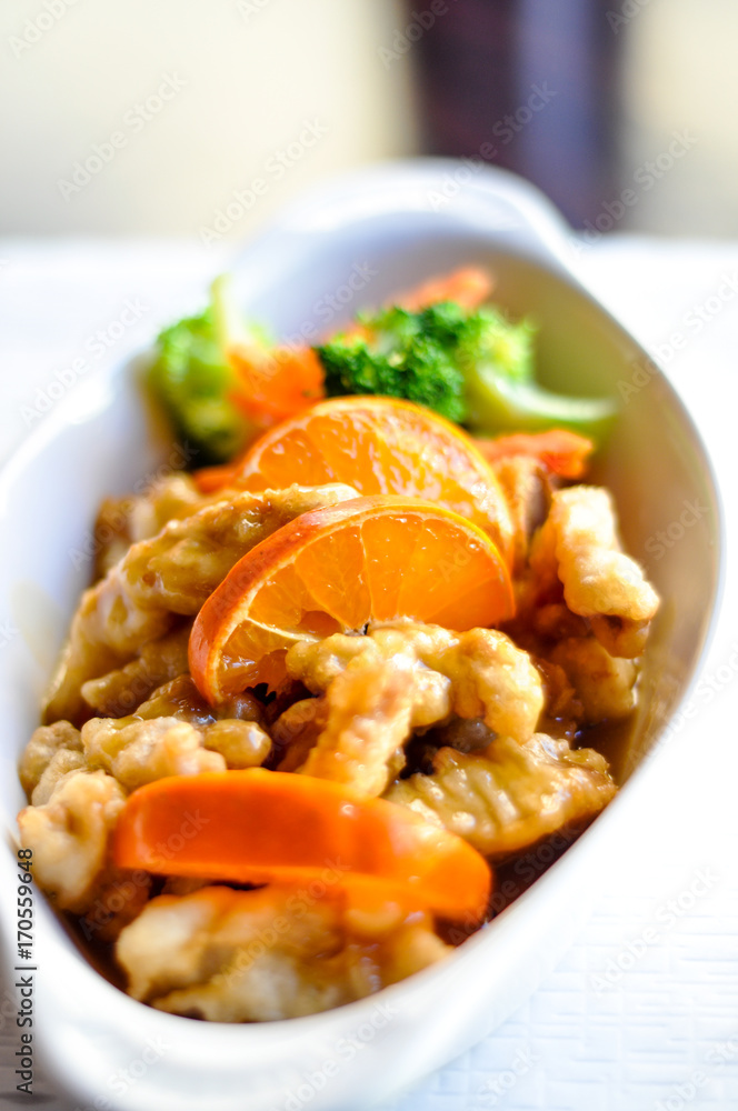 Orange Chicken, Light battered chicken with broccoli, carrot and orange sauce. Orange Chicken, Light battered chicken with broccoli, carrot and orange sauce.