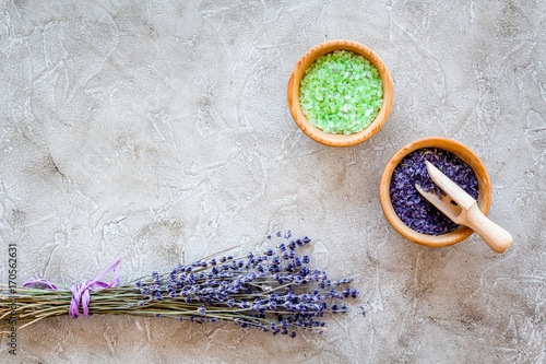 bath salt in herbal cosmetic with lavender on stone desk background top view space for text