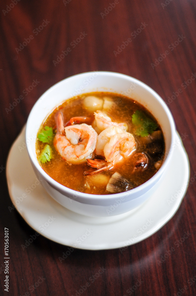 Shrimp Tom Yum, Mushroom, tomatoes, lemongrass, lime leave, galangal in Thai chili sour broth. Shrimp Tom Yum, Mushroom, tomatoes, lemongrass, lime leave, galangal in Thai chili sour broth.