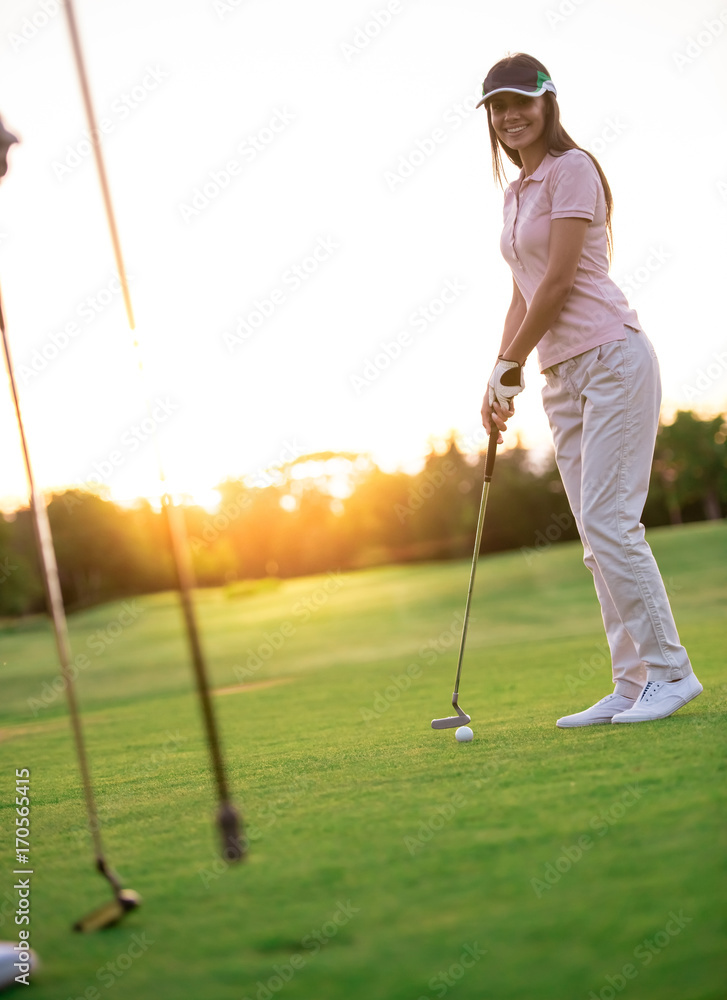 Fototapeta premium Couple playing golf