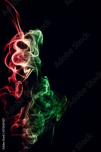 Fototapeta Naklejka Na Ścianę i Meble -  Abstract color smoke on black background, smoke background,red and green and brown ink background, red ,green, brown