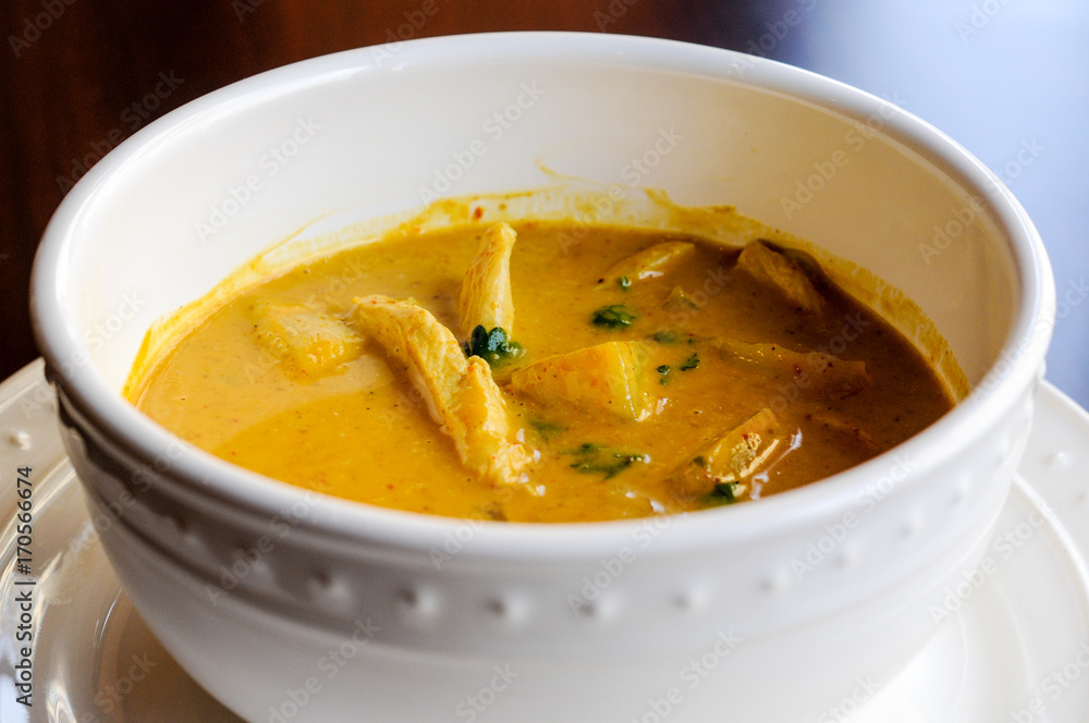 Yellow Curry, A mild curry sauce and coconut milk with potatoes and green peas. Yellow Curry, A mild curry sauce and coconut milk with potatoes and green peas.