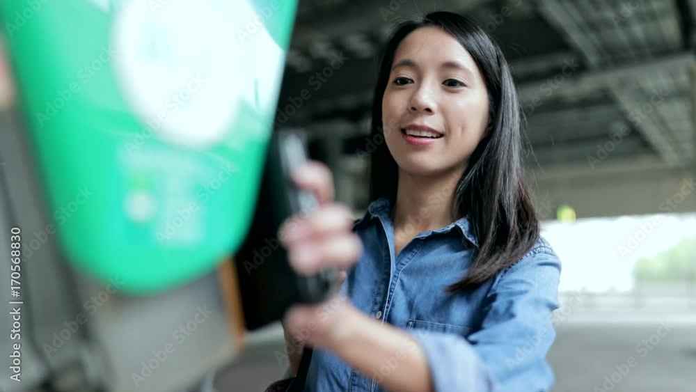 Slow motion of woman using card for paying the transportation fee Slow motion of woman using card for paying the transportation fee