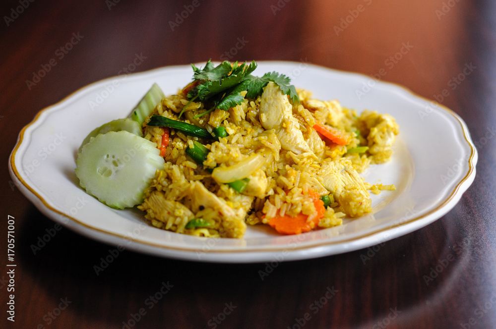 Curry Fried Rice, Stir-fried with egg, onions, green peas, carrots and seasoned with curry powder. Curry Fried Rice, Stir-fried with egg, onions, green peas, carrots and seasoned with curry powder.