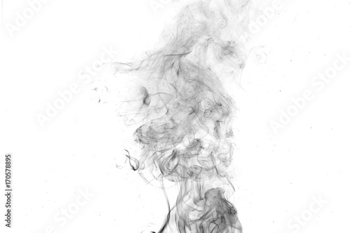 Black smoke on a white background,Abstract black smoke swirls over white background, fire smoke