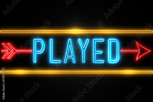 Played - fluorescent Neon Sign on brickwall Front view