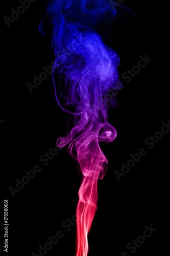 Movement of smoke,Red and blue smoke swirl on black background, Color smoke on black background