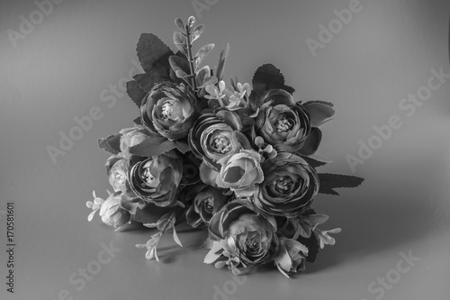 Flowers are on a black and white background.