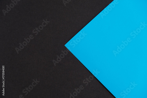 The Torn black Paper and space with sky blue paper background   black friday shopping concept.