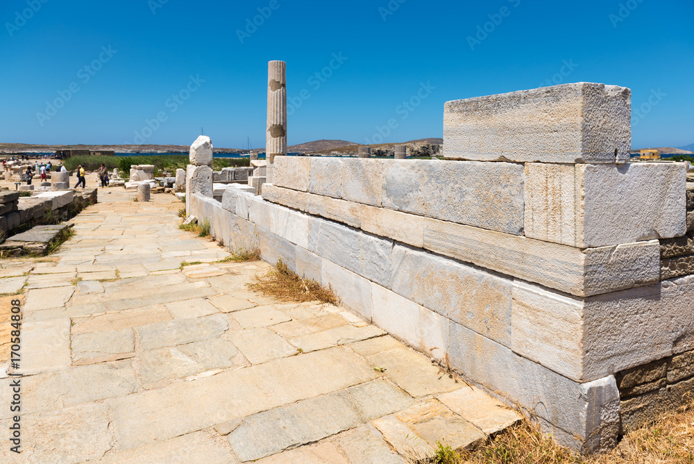 Archaeological ruins of a city in Delos island in Cyclades archipelago, Greece.