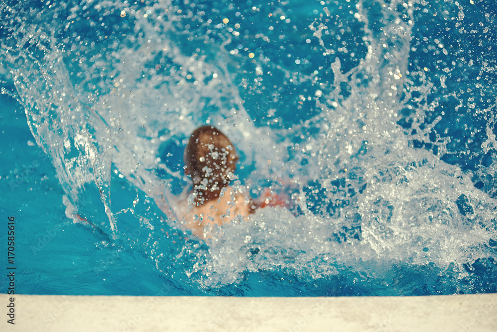 Splashes in the swimming pool.