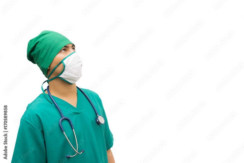 Handsome man doctor in green gown with stethoscope thinking while looking up,isolated on white in studio with copy space Handsome man doctor in green gown with stethoscope thinking while looking up,isolated on white in studio with copy space