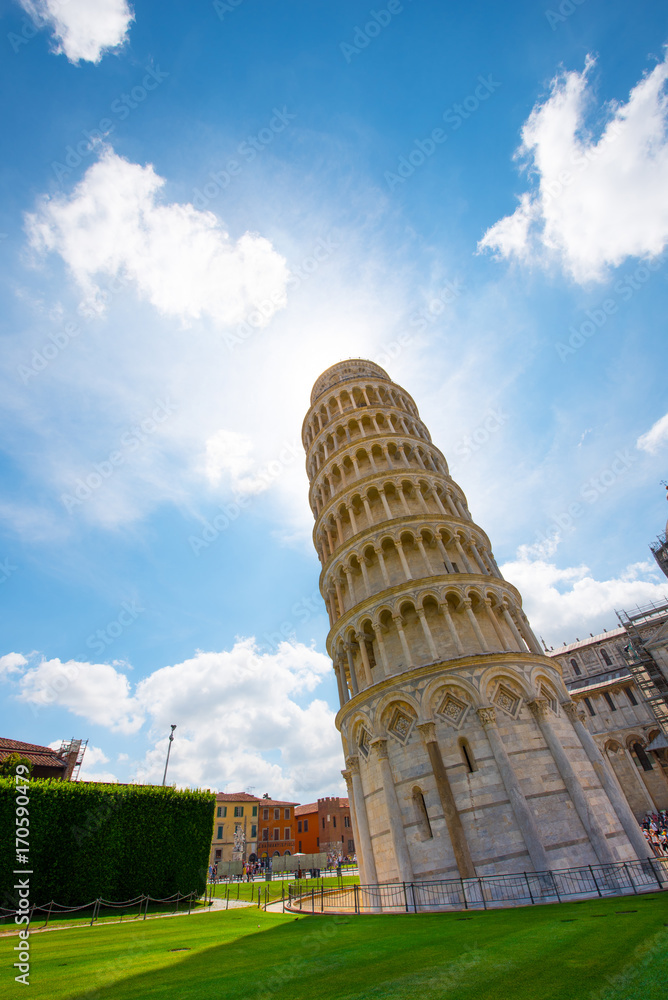 Amazing landscape with famous leaning tower in Pisa, Italy, Europe in sunlight (wallpapers, greeting cards, Honeymoon, attractions - concept)