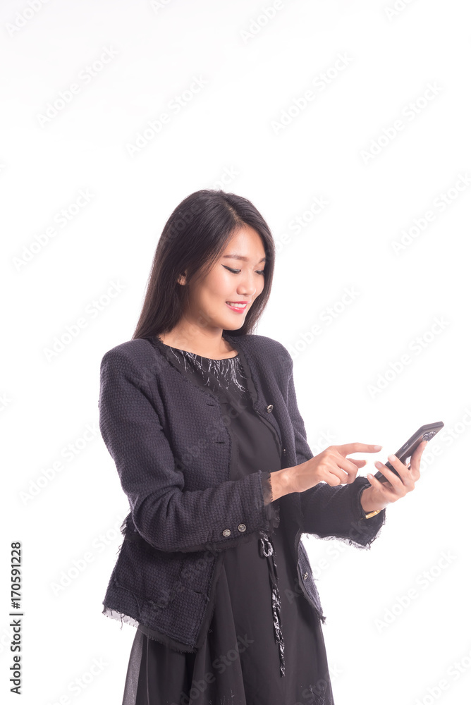 Business Asia women in black Casual wear working on smart phone ,isolated on white Business Asia women in black Casual wear working on smart phone ,isolated on white