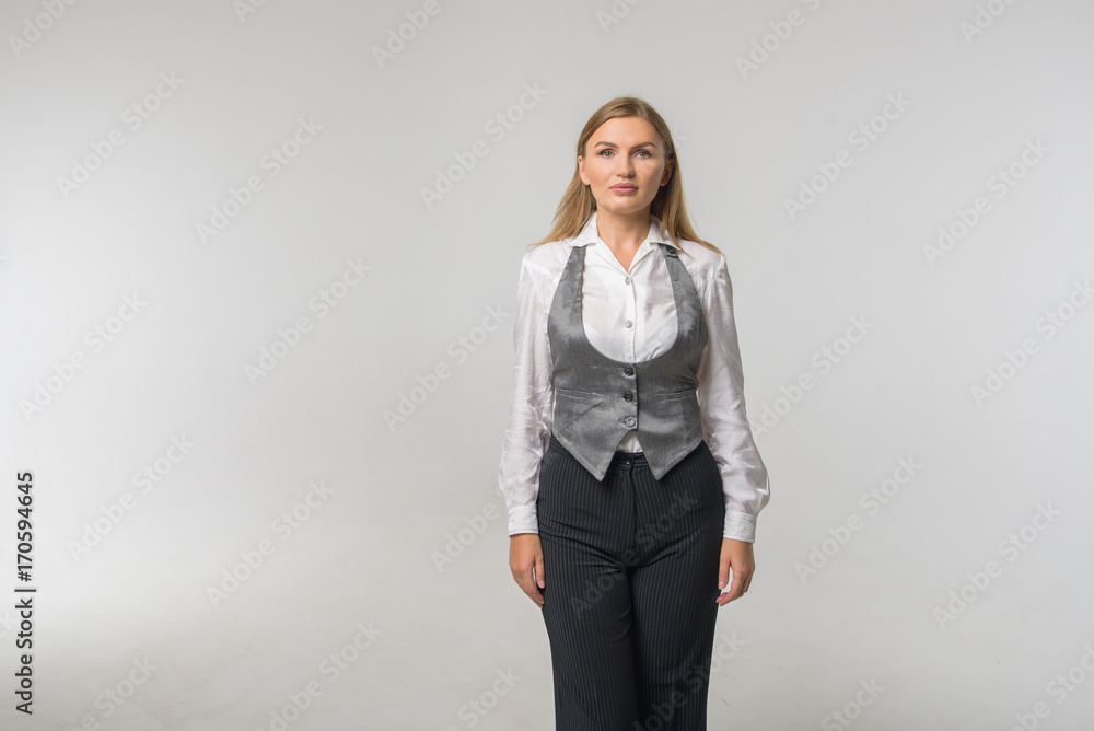 Sexy elegant woman in natural beauty fashion style. Girl wearing in clothes casual formal suit and white cotton blouse silk Businesswoman in a suit, with space for text and advertising Sexy elegant woman in natural beauty fashion style. Girl wearing in clothes casual formal suit and white cotton blouse silk Businesswoman in a suit, with space for text and advertising