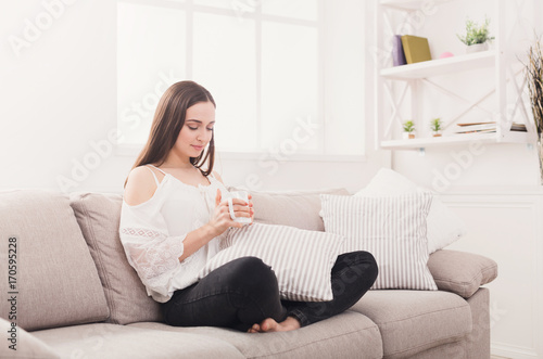 Happy woman at home with coffee Free Download Happy woman at home with coffee - GFXLoad