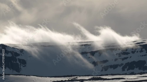 Dramatic Cloud Formation over Lambadalsfjall Mountain in the Westfjords, Iceland photo