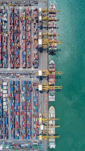 container,container ship in import export and business logistic,By crane,Trade Port , Shipping,cargo to harbor.Aerial view,Water transport,International,Shell Marine,transportation,logistic,trade,port