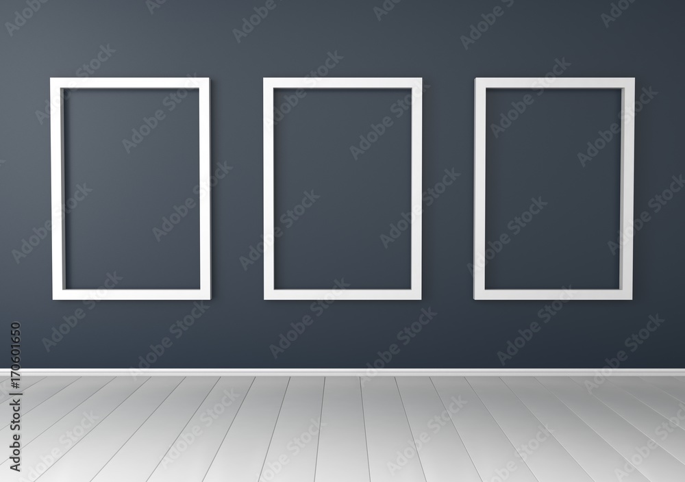 Three white empty frames on dark wall 