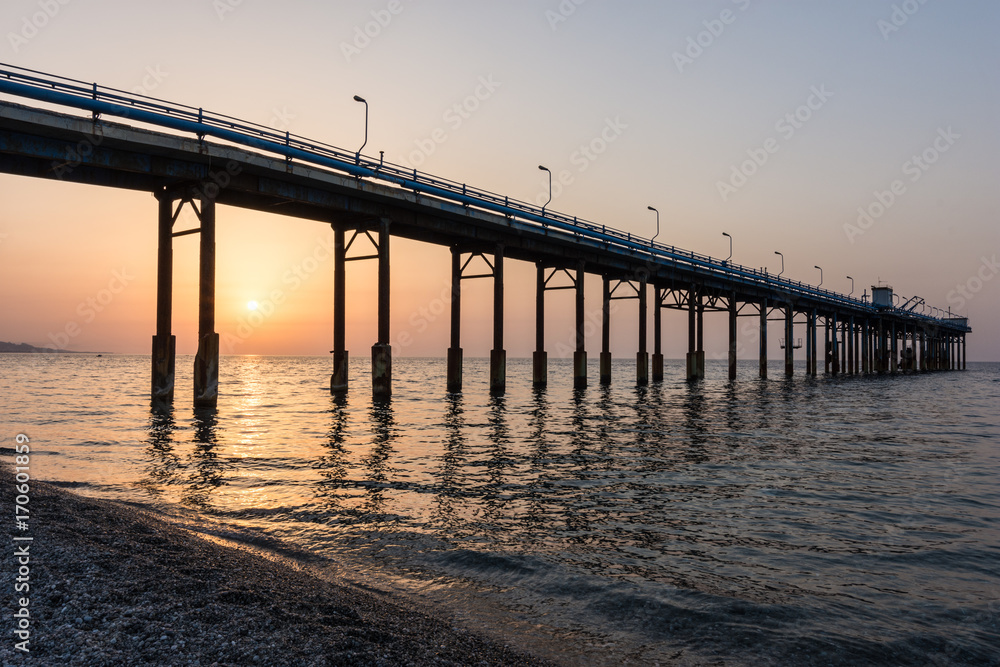 Wonderful seascape of a Pier in the sunrise.