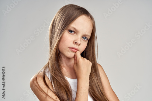 little girl, portrait, light gray background