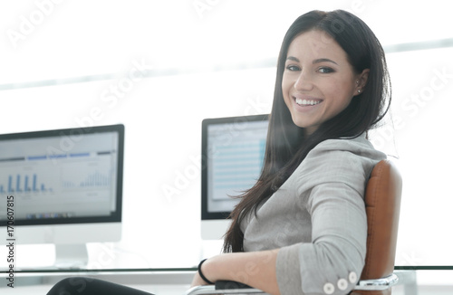 business woman working with financial charts on computer
