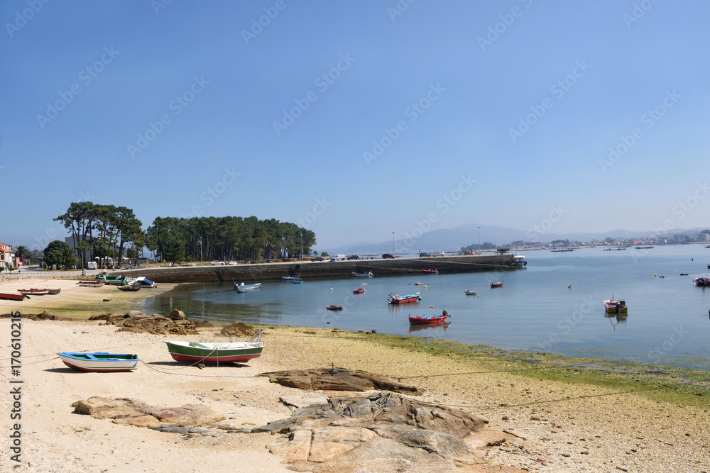 Arousa Island boats on the beach Praia A Sapeira, Pontevedra province, Galicia, Spain