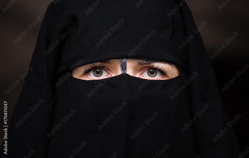 Green eyed young european woman wears hijab. Green eyed young european woman wears hijab.