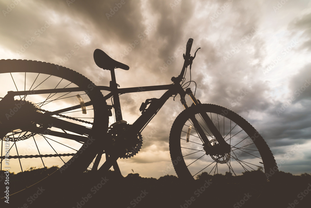 Fototapeta Mountain biking with storm