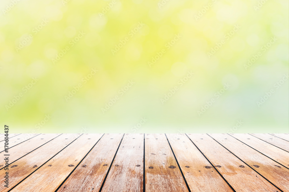 Empty wooden table with party in garden background blurred. wooden table border with blurred beautiful golden background. Empty wooden table with party in garden background blurred. wooden table border with blurred beautiful golden background.