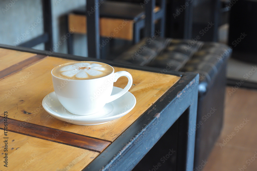 Coffee cup in coffee shop,Cup of coffee on a wooden table,cup of coffee on table in cafe,cup of cappuccino