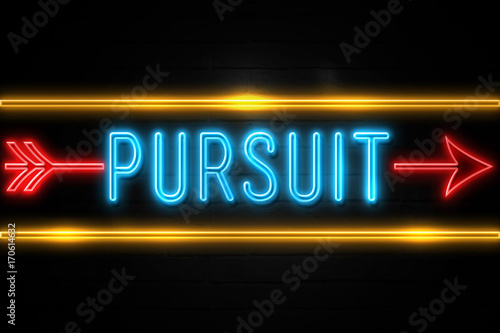 Pursuit  - fluorescent Neon Sign on brickwall Front view