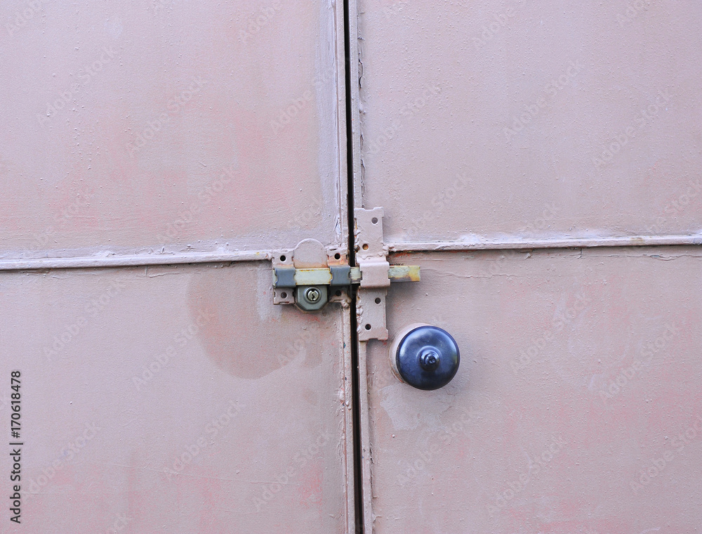 Closed metal door with safety lock Stock Photo | Adobe Stock