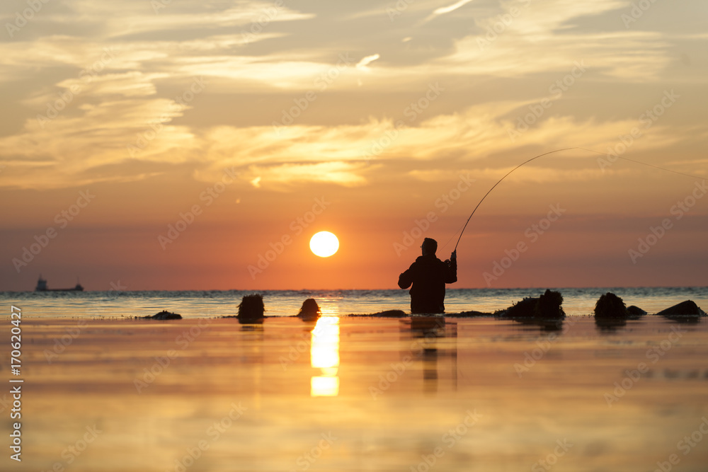 flyfishing man at dawn