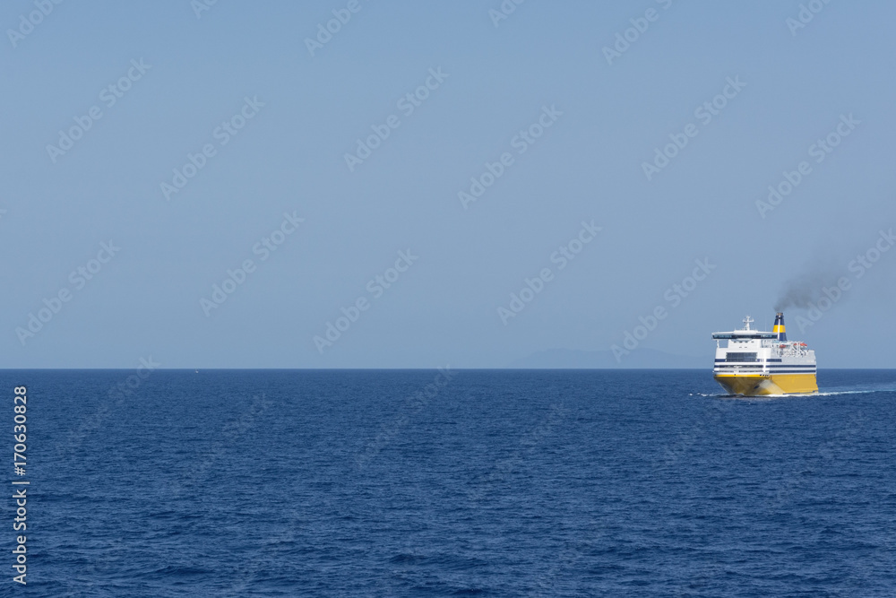 view of an yellow ferry at the calm blue sea