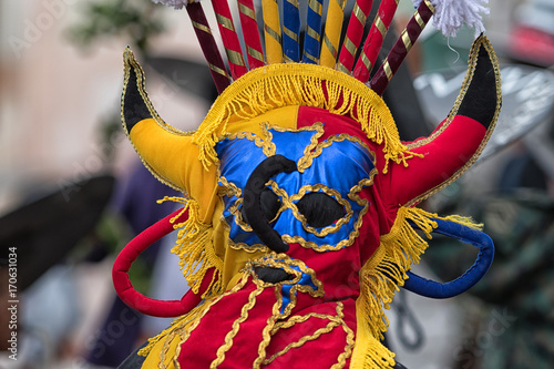 colourful indigenoius mask in Ecuador photo