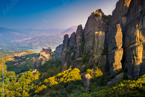 Photography Mountain scenery with Meteora rocks and Roussanou Monastery, landscape place of monasteries on the rock