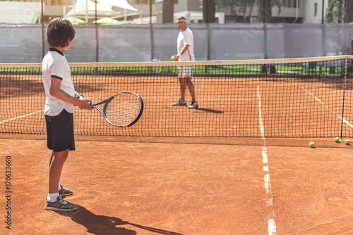 Confident tennis players ready for game