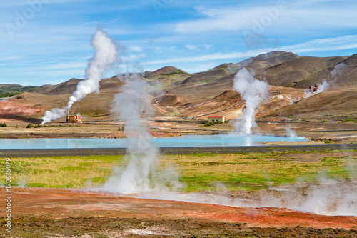 Myvatn geothermal area, northern Iceland. Geothermal power station near the blue lake photo